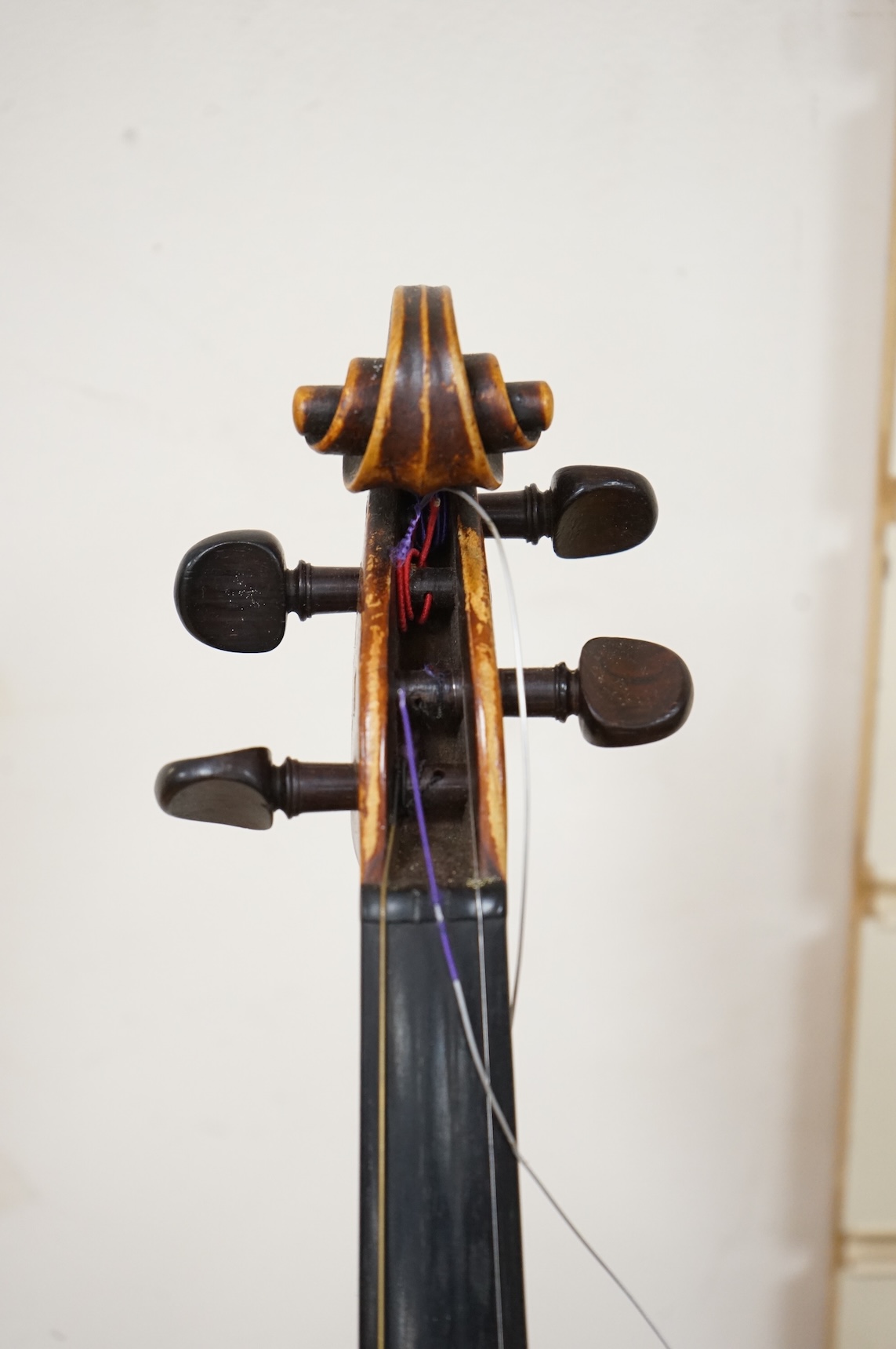 An 18th century violin after Klotz school, 36cm body, with a well cut scroll and an Hill reference number (1191) to the bottom end of the fingerboard, in a Rushworth and Draper case.